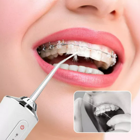 Irrigador dental